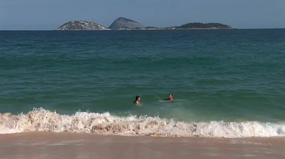 two people in the sea swimming